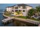 Modern waterfront home featuring a private dock and luxurious pool at 2081 Michigan Ne Ave, St Petersburg, FL 33703