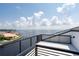 Rooftop terrace with amazing wide water views and sleek black metal railings at 2081 Michigan Ne Ave, St Petersburg, FL 33703