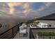 Elegant rooftop deck features comfortable seating, a fire pit, and scenic water views at 2081 Michigan Ne Ave, St Petersburg, FL 33703