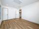 A bedroom with two windows and light-colored wood floors at 2427 10Th S Ave, St Petersburg, FL 33712