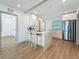A modern kitchen features quartz countertops, stainless steel appliances, and an open layout at 2427 10Th S Ave, St Petersburg, FL 33712