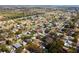 Aerial view of the neighborhood showcasing tree-lined streets and surrounding homes at 263 42Nd Ne Ave, St Petersburg, FL 33703