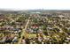Another aerial view of the neighborhood featuring tree coverage and a view of the city at 263 42Nd Ne Ave, St Petersburg, FL 33703