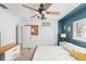 Another bedroom view showing a ceiling fan, natural light, and neutral decor at 263 42Nd Ne Ave, St Petersburg, FL 33703