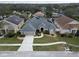 Desirable neighborhood lot featuring a home with lush landscaping, well maintained lawn, and mature trees at 5206 Whispering Leaf Trl, Valrico, FL 33596