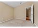 A spacious bedroom with carpeted floors at 5809 War Admiral Dr, Wesley Chapel, FL 33544