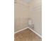 A walk in closet offers ample storage with wire shelving at 5809 War Admiral Dr, Wesley Chapel, FL 33544