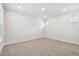 Bright bedroom with carpeted floors, white walls, and recessed lighting at 687 Allora Ave, Nokomis, FL 34275
