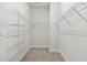 Spacious walk-in closet with wire shelving for storage solutions at 687 Allora Ave, Nokomis, FL 34275