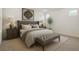 Serene bedroom with a tufted headboard, neutral color palette, stylish nightstands, and accent bench at 687 Allora Ave, Nokomis, FL 34275