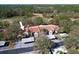 Townhome complex with covered parking in a verdant setting near a golf course, offering serene community living at 3505 Tarpon Woods Blvd # K406, Palm Harbor, FL 34685