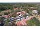 Charming townhomes with red tile roofs nestled among lush trees and green spaces near the golf course at 3505 Tarpon Woods Blvd # K406, Palm Harbor, FL 34685