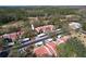 Charming townhomes with red tile roofs nestled among lush trees and green spaces near the golf course at 3505 Tarpon Woods Blvd # K406, Palm Harbor, FL 34685