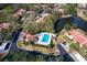 Aerial view of the community pool area with a jacuzzi, perfect for relaxation and social gatherings at 3505 Tarpon Woods Blvd # K406, Palm Harbor, FL 34685