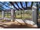 Sunroom offers views of the backyard, featuring a concrete floor and an aluminum and glass roof at 3505 Tarpon Woods Blvd # K406, Palm Harbor, FL 34685