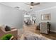 Open concept living space featuring hardwood floors and access to other living areas at 10079 83Rd Way, Seminole, FL 33777