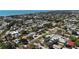 Breathtaking aerial shot of the residential area with tree coverage and its proximity to the ocean at 1309 Nokomis S Ave, Venice, FL 34285