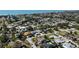 Expansive aerial view of the town and the ocean, highlighting its serene setting and community layout at 1309 Nokomis S Ave, Venice, FL 34285