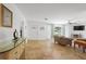 Bright living room featuring stone flooring, modern furniture, and a large window at 1309 Nokomis S Ave, Venice, FL 34285