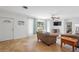 Inviting living room featuring neutral paint, tile flooring, and an abundance of natural light at 1309 Nokomis S Ave, Venice, FL 34285