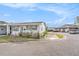 Lovely single-story home featuring well-kept landscaping and covered entrance at 5006 Springwood N Ave # 119, Pinellas Park, FL 33782