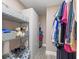 Walk-in closet with shelving and storage space for clothing and accessories at 6265 Sun Blvd # 101, St Petersburg, FL 33715