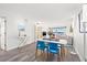 Bright open-concept dining area with water views and seating for four at 6265 Sun Blvd # 101, St Petersburg, FL 33715