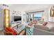 Bright living room with water views, comfortable seating, and modern decor at 6265 Sun Blvd # 101, St Petersburg, FL 33715