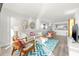 Open concept living area with stylish furnishings and plenty of natural light at 6265 Sun Blvd # 101, St Petersburg, FL 33715