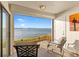 Relaxing patio with comfortable seating and a stunning waterfront view at 6265 Sun Blvd # 101, St Petersburg, FL 33715