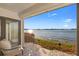 Charming patio view overlooking water, with chairs for relaxing at 6265 Sun Blvd # 101, St Petersburg, FL 33715