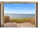 Scenic water view from patio, with beautiful landscaping at 6265 Sun Blvd # 101, St Petersburg, FL 33715