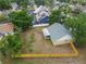 Aerial view of home showcasing the yard, screened in patio and new fence at 13215 Parkhurst Ct, Riverview, FL 33569