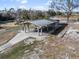 Aerial view of an outdoor picnic shelter with a playground nearby, providing a space for community gatherings at 13215 Parkhurst Ct, Riverview, FL 33569