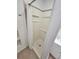 The standing shower offers a tiled accent stripe and built-in shelves for added convenience at 205 W Hilda St, Tampa, FL 33603