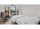 Bedroom with a large window with bright lighting and spacious closet at 2765 Via Cipriani # 1232B, Clearwater, FL 33764
