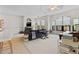 Living area with lots of natural light, a fireplace, and neutral colors at 2765 Via Cipriani # 1232B, Clearwater, FL 33764