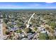 Aerial view of the community showcasing the home's location and proximity to the coast and the neighborhood at 3108 Ash Ct, Dunedin, FL 34698