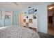 Light-filled bedroom features ample storage in a bright and airy interior design at 3108 Ash Ct, Dunedin, FL 34698