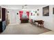 Cozy living room with neutral carpet, perfect for gatherings and relaxation at 3108 Ash Ct, Dunedin, FL 34698