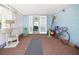 Indoor-outdoor patio with neutral shades, perfect for relaxation or recreation at 3108 Ash Ct, Dunedin, FL 34698