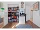 A home office space featuring built-in bookshelves for ample storage and organization at 3108 Ash Ct, Dunedin, FL 34698