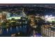 Night aerial shot featuring lit buildings, a bridge over the river, and active streets at 777 N Ashley Dr # 2503, Tampa, FL 33602