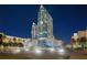 Stunning exterior view of a high-rise condominium with palm trees and manicured landscaping at 777 N Ashley Dr # 2503, Tampa, FL 33602