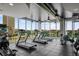 Well-equipped gym space featuring treadmills and other equipment with panoramic city views at 777 N Ashley Dr # 2503, Tampa, FL 33602