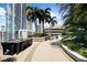 Outdoor terrace with dining table and grill, surrounded by lush greenery and city views at 777 N Ashley Dr # 2503, Tampa, FL 33602