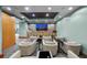 Modern theater room with comfortable seating, a large screen, and ambient lighting at 777 N Ashley Dr # 2503, Tampa, FL 33602