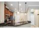 Modern kitchen featuring granite countertops, stainless steel appliances, and a breakfast bar at 12537 Silverdale St, Tampa, FL 33626
