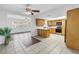 Open kitchen with oak cabinets, stainless steel appliances, and access to the living area at 13851 102Nd Ave, Largo, FL 33774