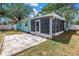 The patio area boasts an enclosed, screened-in space for relaxing outdoors at 13851 102Nd Ave, Largo, FL 33774
